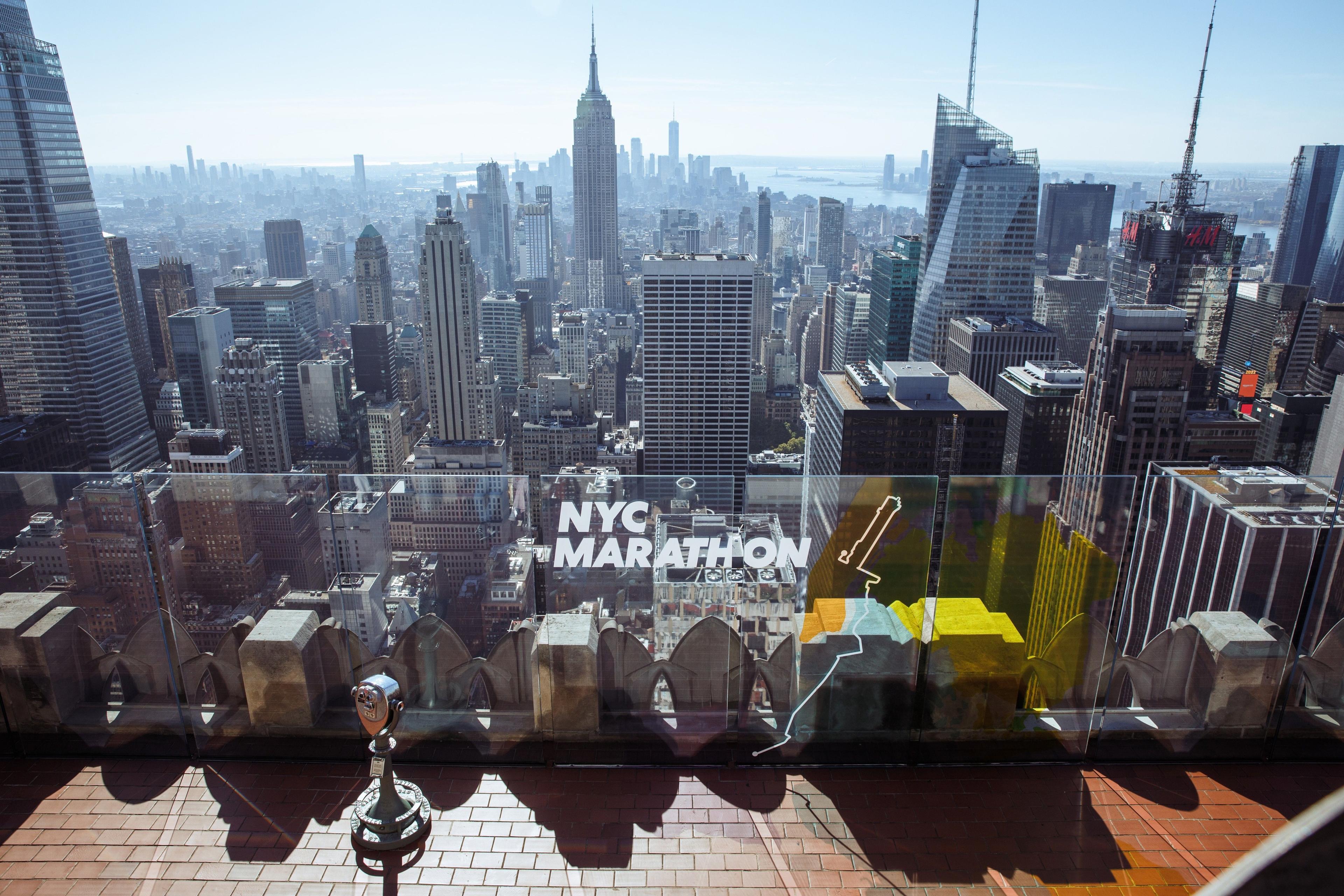 NYC Marathon decals on the glass walls at Top of the Rock