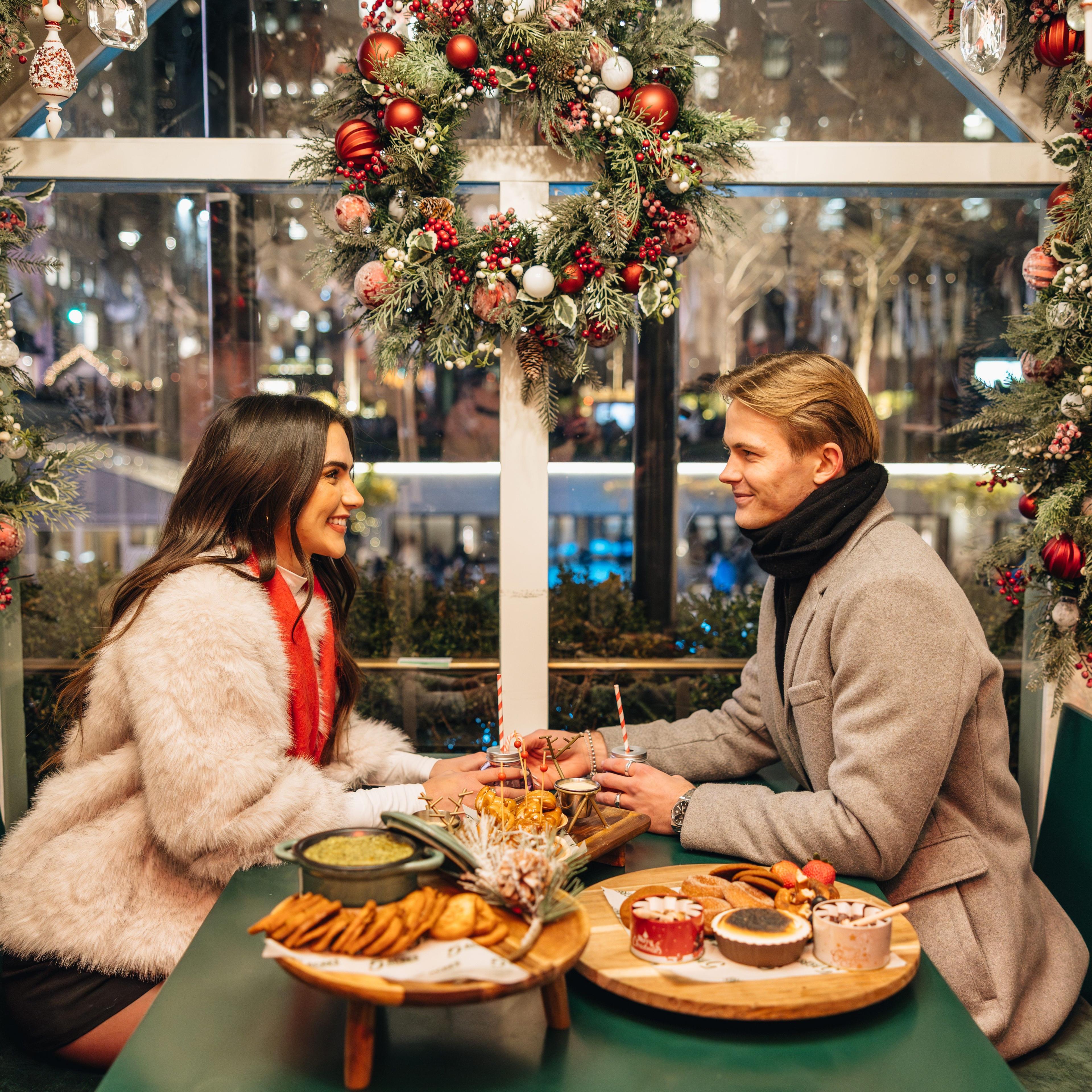 a couple in the chalets