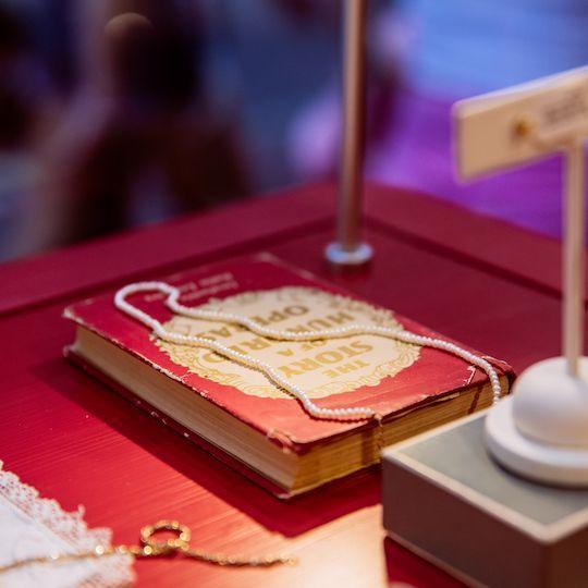 Pearl necklace from Catbird on a red vintage book