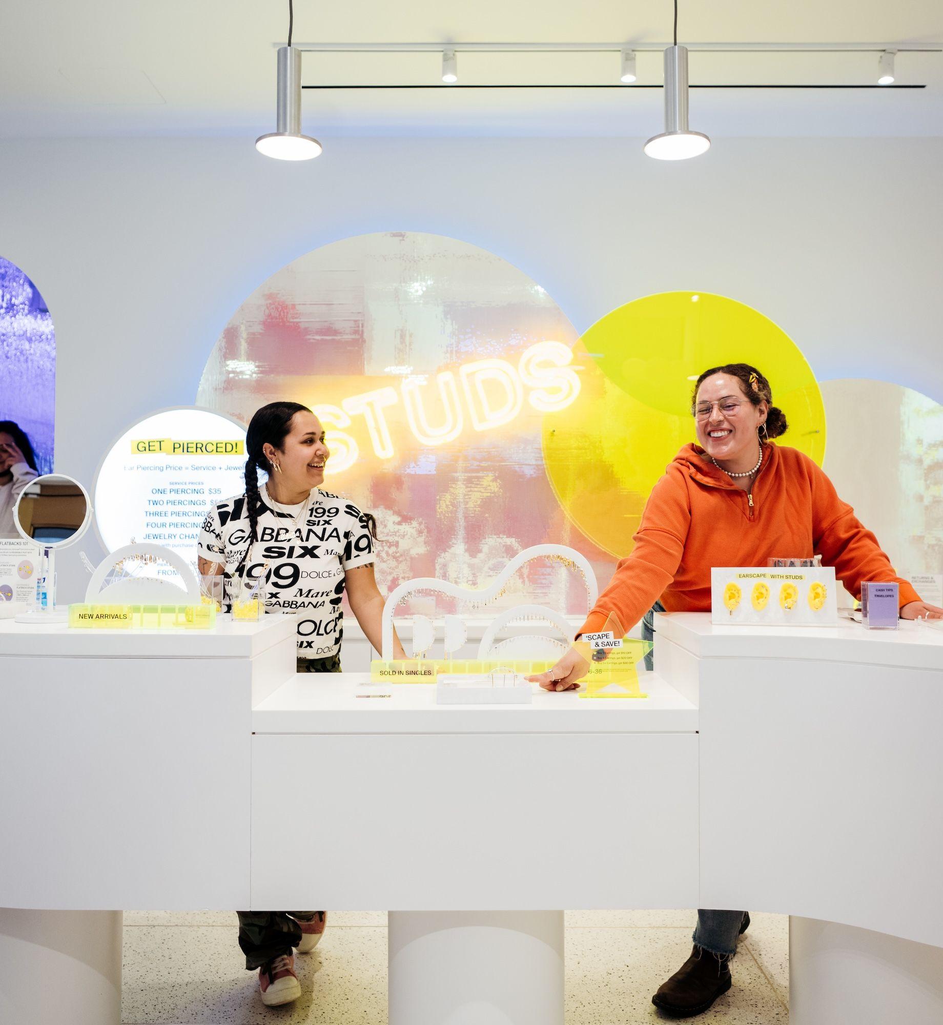 Two employees inside Studs' new studio at Rockefeller Center