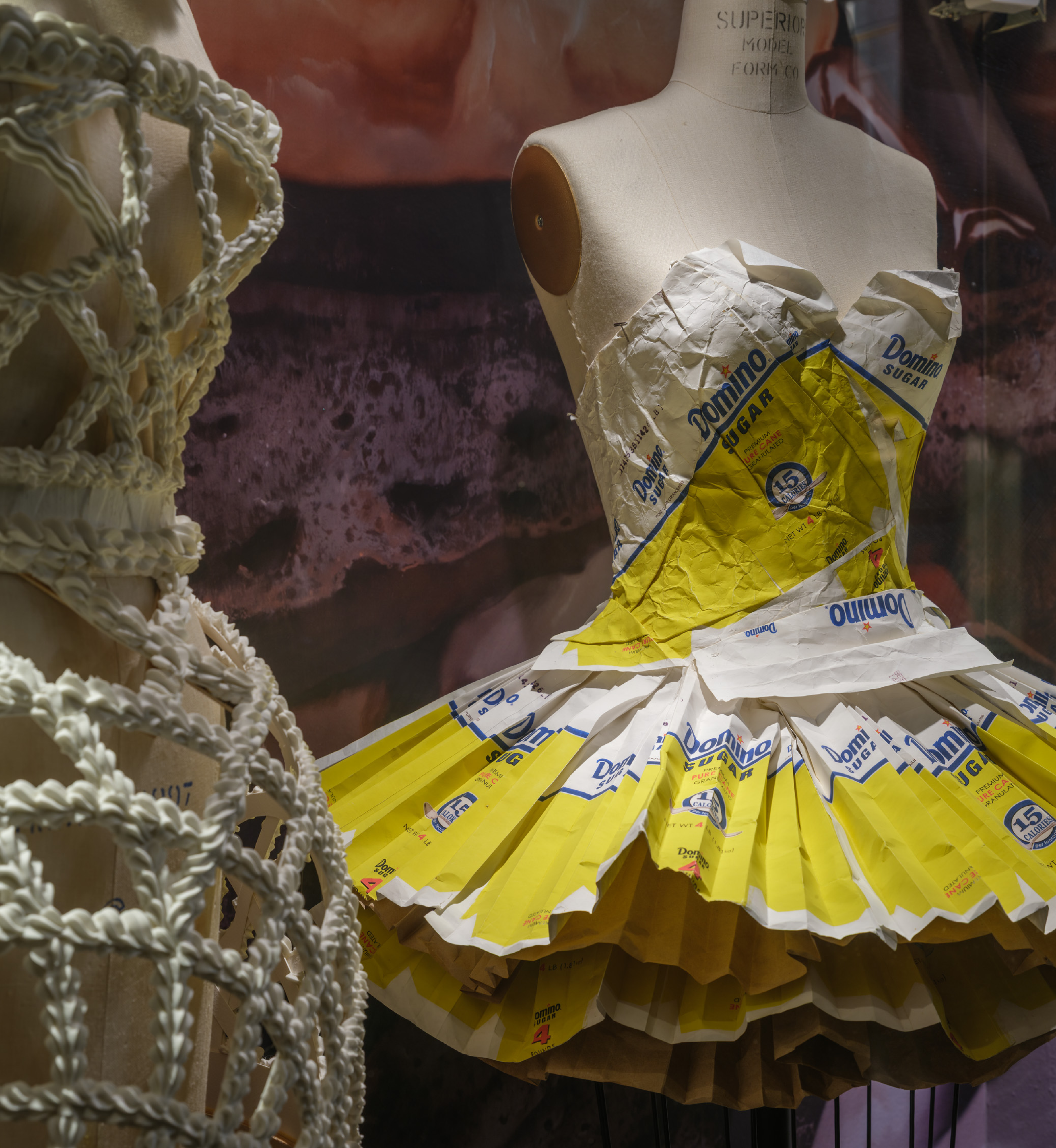Two dresses constructed by artist Will Cotton on display at Rockefeller Center