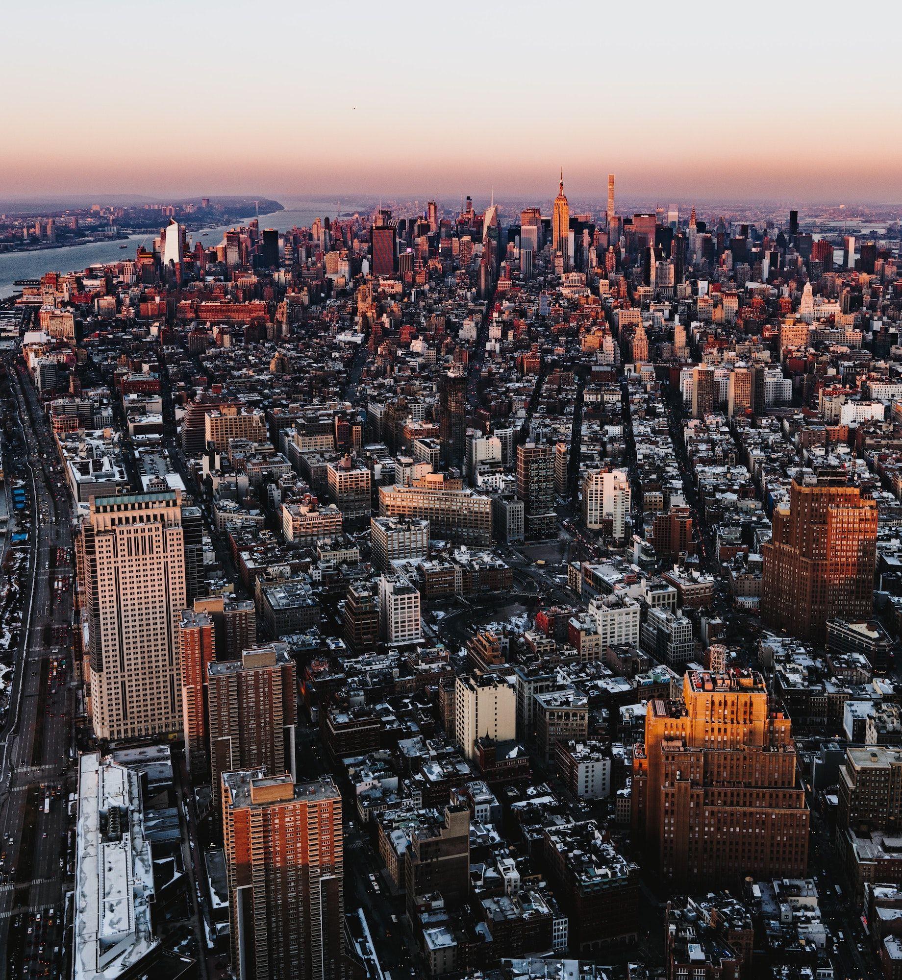 Aerial view of the New York City skyline at sunset
