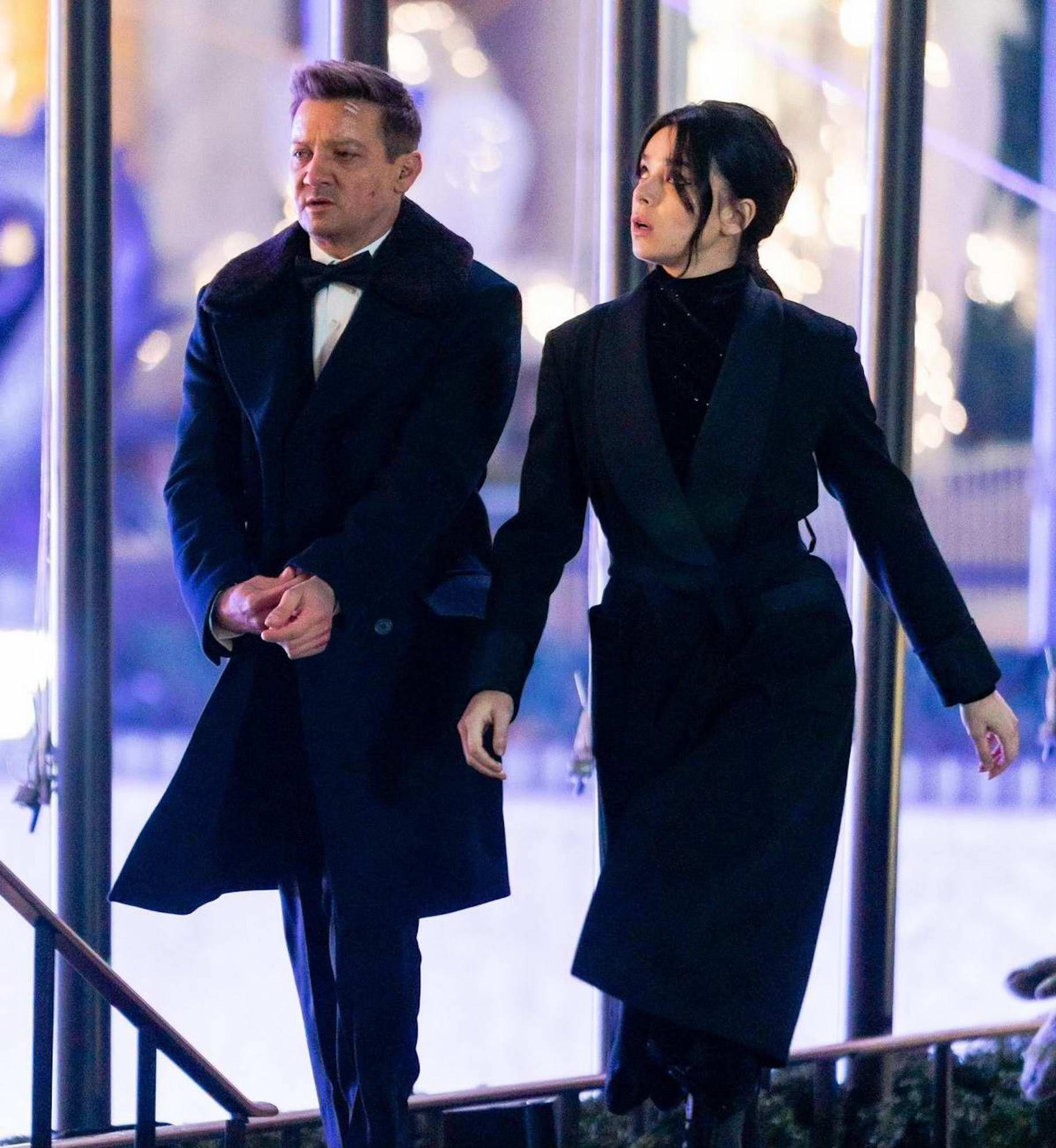 Jeremy Renner and Hailee Steinfeld filming Hawkeye at Rockefeller Center