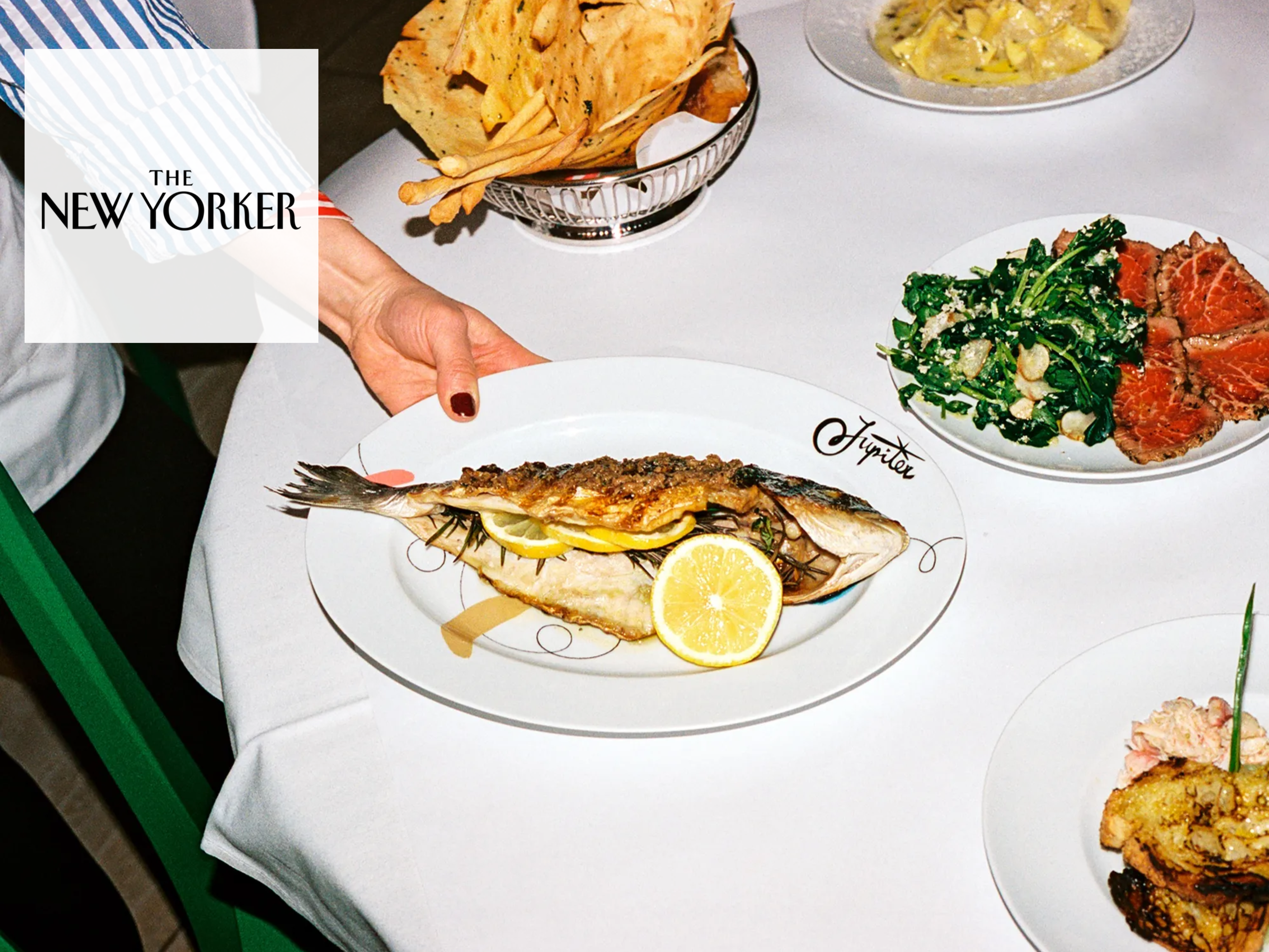 Dishes at Jupiter include roasted whole dorade and beef sott’olio, for which a seared filet is sliced thin and marinated in olive oil.