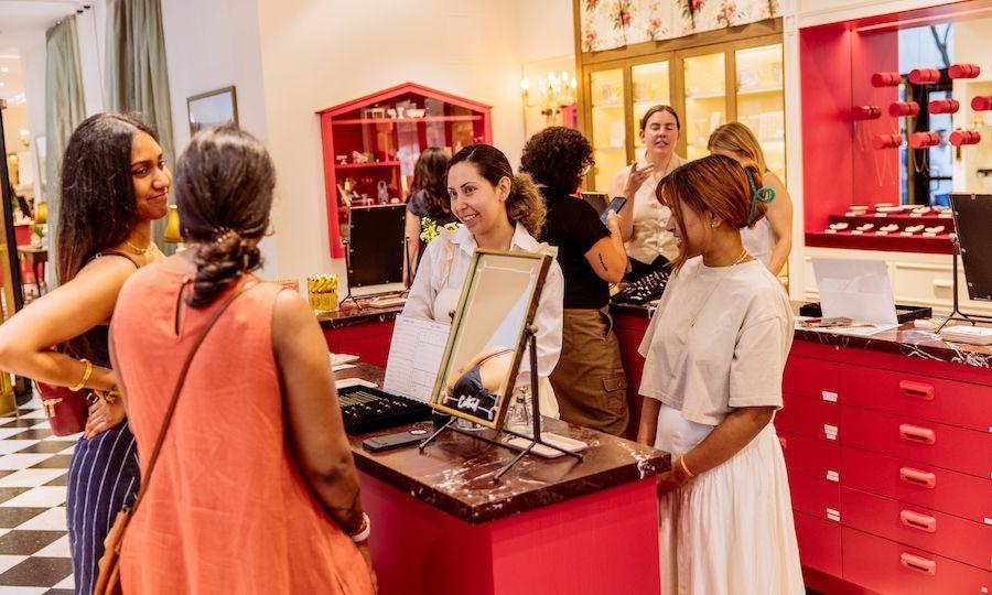 Customers and employees inside the new Catbird store at Rockefeller Center