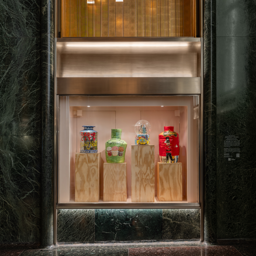 Four ceramic sculptures by artist Jake Clark on display at Rockefeller Center