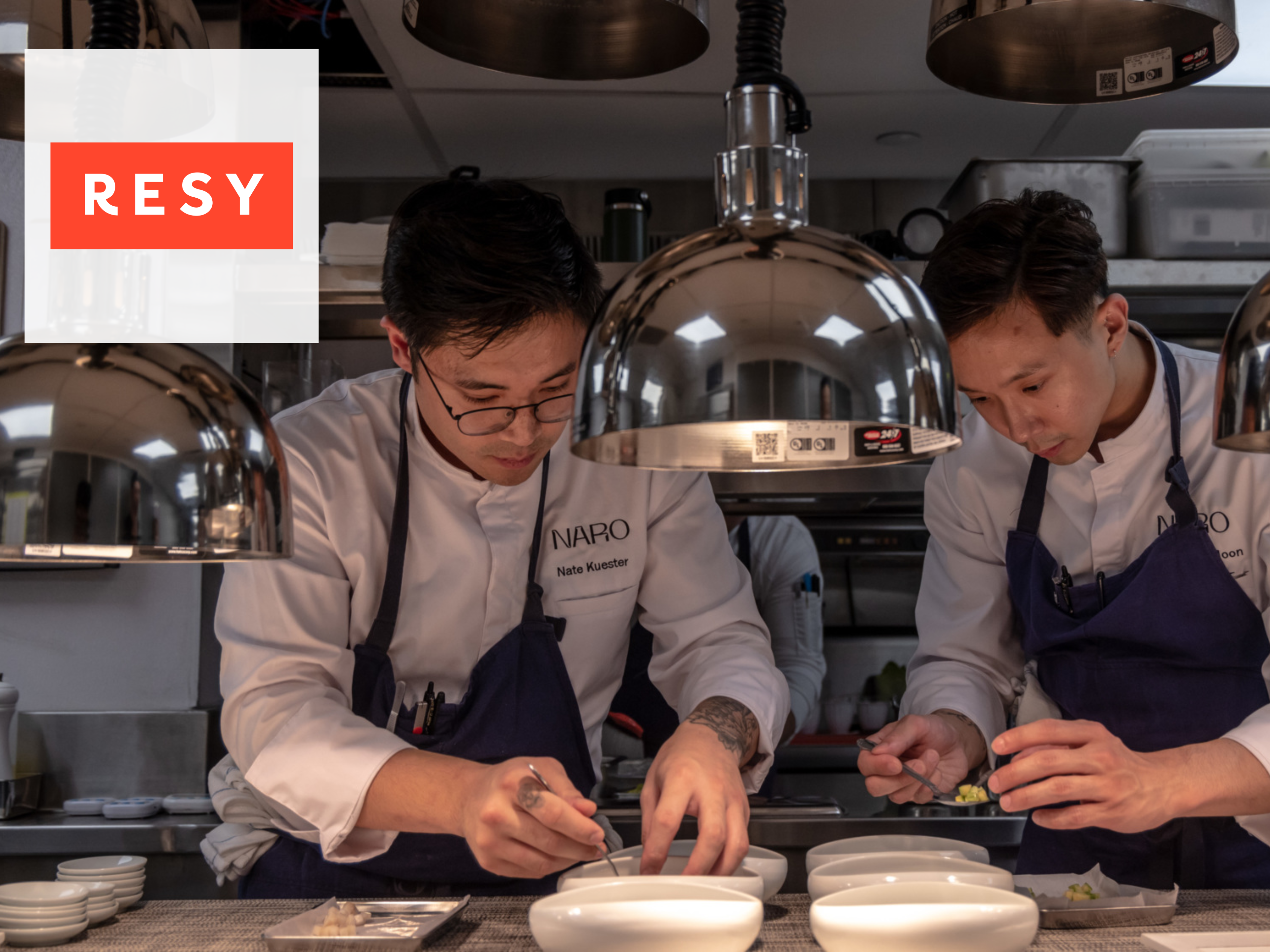 Executive chef Nate Kuester and sous chef Jonathan Moon prepare dishes at NARO.