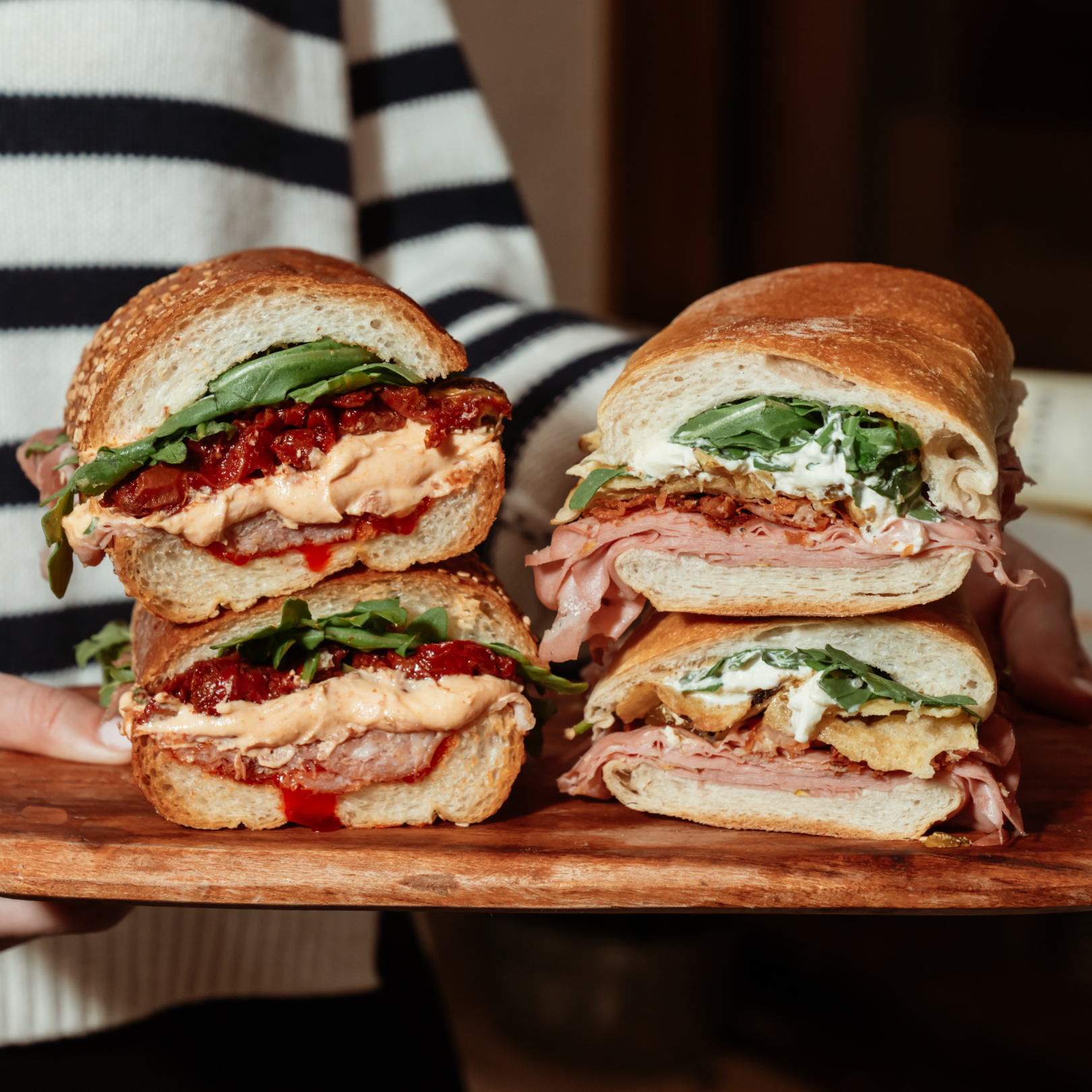 Two sandwiches from Alidoro on a display board